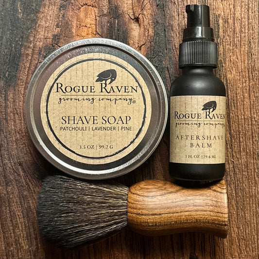rogue raven grooming shave collection with shave soap, aftershave balm, and premium synthetic bristle shave brush with an ebony wood handle